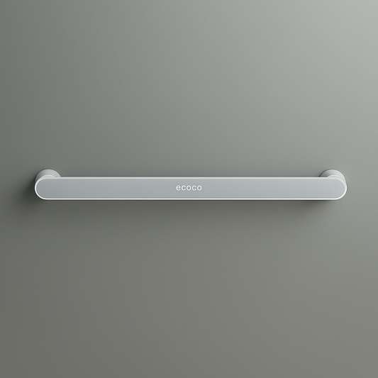 A grey wall-mounted rack organizer with the brand 'ECOCO' displayed on the top, hosting a white towel and a cloth with a cartoon design.