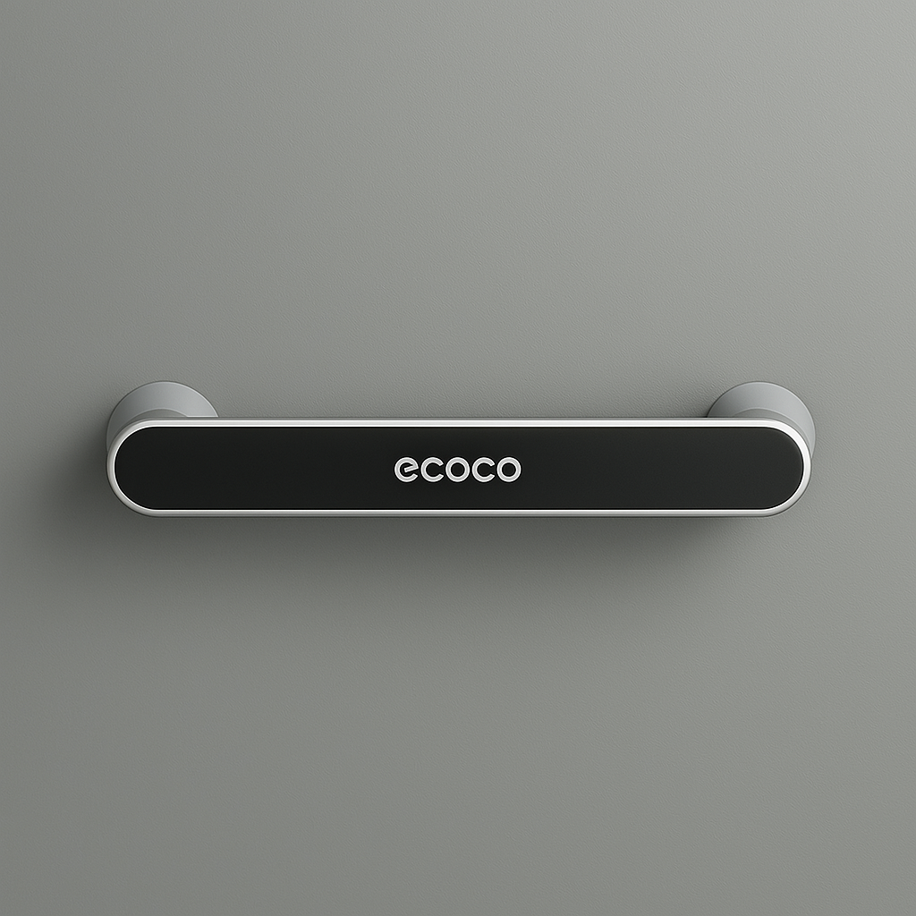 A black wall-mounted rack organizer with the brand 'ECOCO' displayed on the top, hosting a white towel and a cloth with a cartoon design.