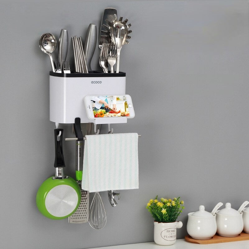 Stylish Ecoco wall-mounted kitchen rack with compartments for cutlery, a towel bar, and hooks for organizing utensils and cookware.