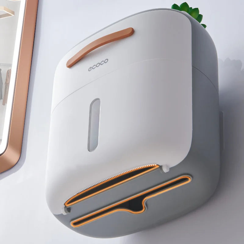 Elegant white wall-mounted tissue dispenser with a sleek design and convenient top storage for small decor items.
