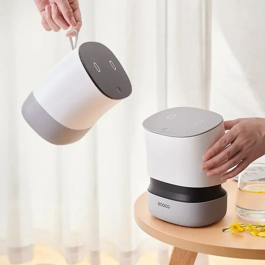 Compact touch-sensitive trash bin with a modern design, ideal for desks, bedrooms, and bathrooms.